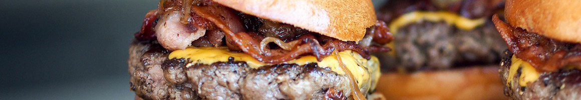 Eating Burger at Apollo Burgers restaurant in Carson, CA.